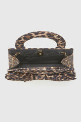 VERDE FASHION | Pochette stampa maculata con fiocco