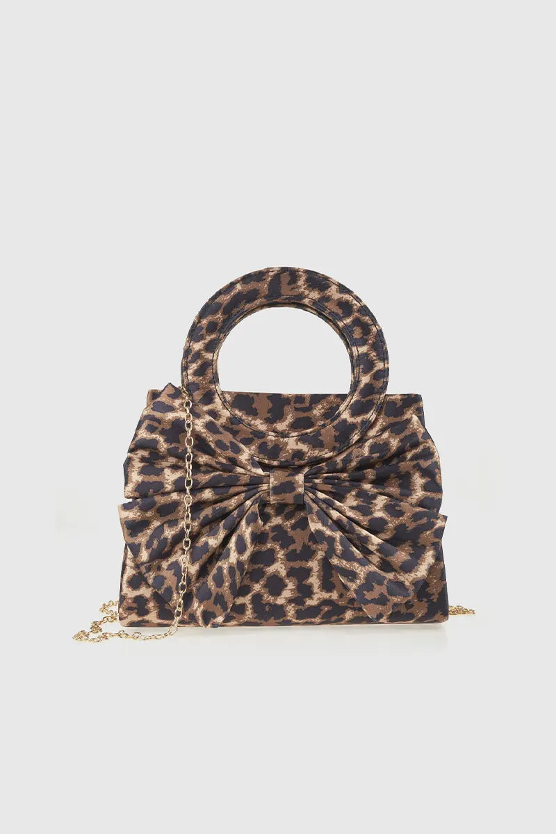 VERDE FASHION | Pochette stampa maculata con fiocco
